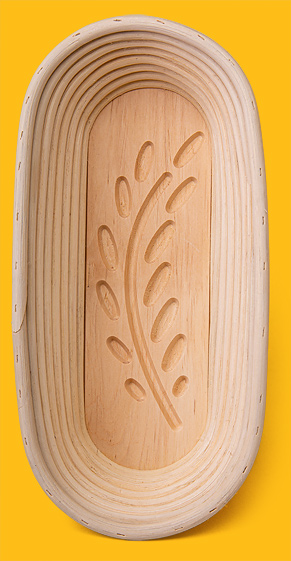 Peddigrohr-Gärkörbchen mit Holzboden und Motiv, lang 1 kg